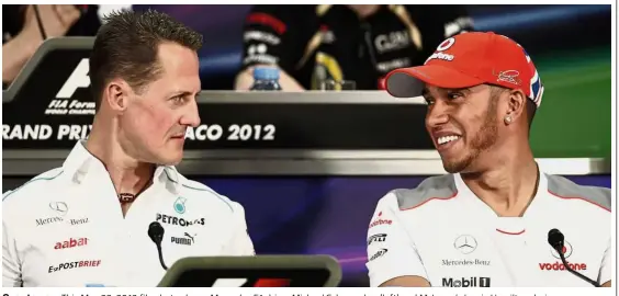  ??  ?? Over to you: This May 23, 2012 file photo shows Mercedes F1 driver Michael Schumacher (left) and McLaren’s Lewis Hamilton during a news conference at the Monaco racetrack. Seven-time world champion Schumacher was then going to leave Mercedes at the end of the season and was going to be replaced by Hamilton. And today, Hamilton is closing in on Schumacher’s various records.