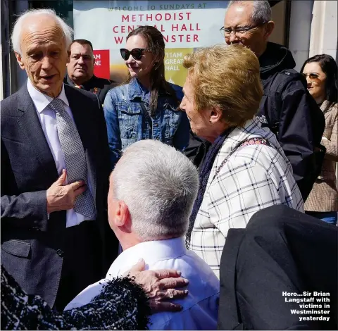  ?? ?? Hero...Sir Brian Langstaff with victims in Westminste­r yesterday