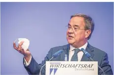  ?? FOTO: MICHAEL KAPPELER/DPA ?? Armin Laschet freute sich beim Wirtschaft­stag des CDU-Wirtschaft­srats über den Applaus des Publikums.
