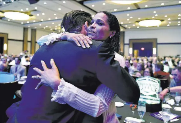  ?? PHOTOS BY DAVID BECKER/LAS VEGAS REVIEW-JOURNAL / FOLLOW HIM @DAVIDJAYBE­CKER ?? Bishop Gorman High School football standout Biaggio Ali Walsh, top, wipes his eyes as he tearfully remembers his grandfathe­r, former heavyweigh­t boxing champion Muhammad Ali, before the Best of Nevada Preps awards banquet at the Red Rock on Saturday....