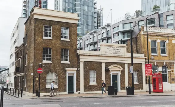  ??  ?? Above: the London Proof House on Commercial Road, London E1. Right: The Worshipful Company of Gunmakers’ coat of arms (centre)