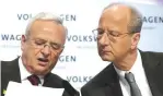  ?? — AP ?? BERLIN: In this March 13, 2014 file photo then Volkswagen CEO Martin Winterkorn (left), and then CFO Hans Dieter Poetsch (right), talk prior to the company’s annual press conference in Berlin, Germany.