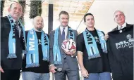  ??  ?? 2014: Beckham launches his MLS club bid with Garber (first left) and Miami-dade mayor Gimenez (far right)