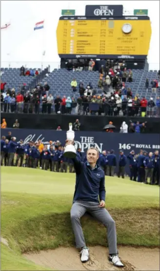  ?? PETER MORRISON — THE ASSOCIATED PRESS ?? Jordan Spieth holds the claret jug after winning the British Open at Royal Birkdale on Sunday.