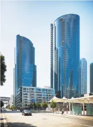  ??  ?? Above left: Lumina features 37- and 42-story towers complement­ed by a pair of eight-story structures in Rincon Hill. Above right: European porcelain lines the floors of bathrooms featuring Kohler fixtures and SieMatic vanities. Below left: Lumina...