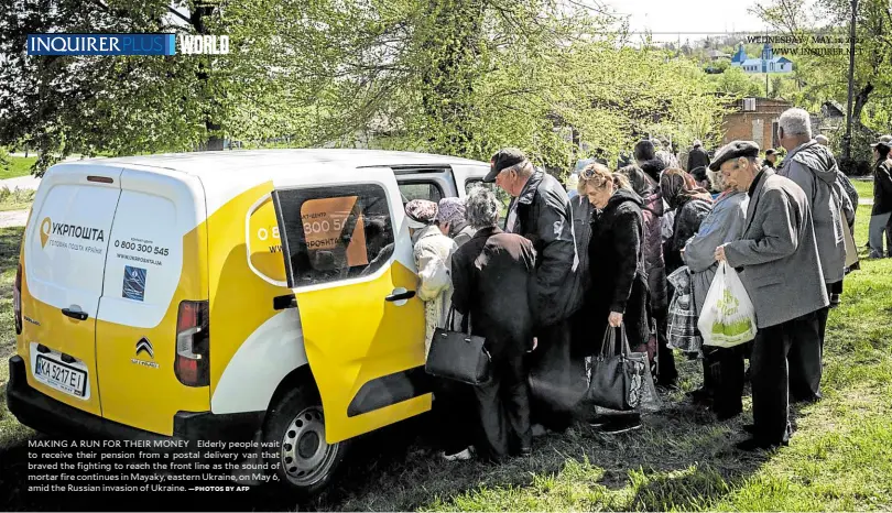  ?? —PHOTOS BY AFP ?? MAKING A RUN FOR THEIR MONEY Elderly people wait to receive their pension from a postal delivery van that braved the fighting to reach the front line as the sound of mortar fire continues in Mayaky, eastern Ukraine, on May 6, amid the Russian invasion of Ukraine.