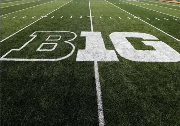  ?? AP PHOTO BY CHARLIE NEIBERGALL ?? In this Aug. 31, 2019, file photo, the Big Ten logo is displayed on the field before an NCAA college football game between Iowa and Miami of Ohio in Iowa City, Iowa.