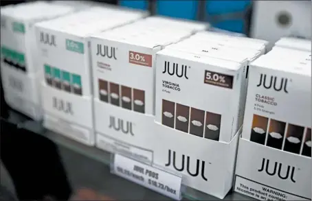  ?? ABEL URIBE/CHICAGO TRIBUNE 2019 ?? Maine Township High School District 207 has joined school districts across the country in filing suit against Juul Labs, which produces vaping devices.