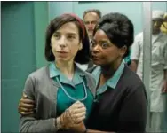  ?? PHOTO COURTESY OF FOX SEARCHLIGH­T PICTURES ?? Sally Hawkins and Octavia Spencer are shown in a scene from “The Shape of Water.”