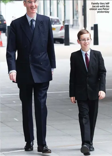  ??  ?? Family ties: MP Jacob with his eldest son Peter yesterday