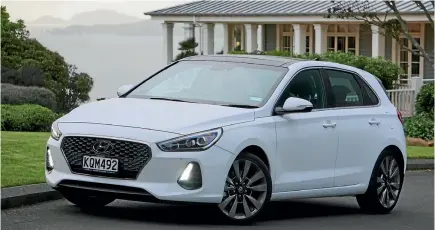  ??  ?? The new Hyundai i30, showing off the brand’s latest iteration of its fluidic sculpture design strategy.