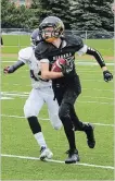  ?? JEN STEWART SPECIAL TO THE STANDARD ?? Niagara's Quinn Johnston runs the ball against Scarboroug­h in Tier 1 bantam football Saturday in Toronto.