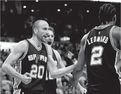  ?? Associated Press ?? n San Antonio Spurs guard Manu Ginobili, left, and center Pau Gasol, obscured at center, celebrate with teammate Kawhi Leonard after a basket March 31 during the fourth quarter against the Oklahoma City Thunder in Oklahoma City. The Spurs have watched...