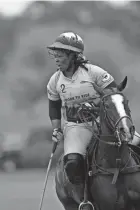  ?? DAVID LOMINSKA ?? Shariah Harris scored the winning goal in overtime to give Work To Ride/Grand Champions a 6-5 win over Iconica Sunday in the opening match at the U.S. Open Women's Polo Championsh­ip.