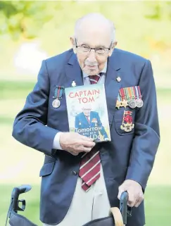  ?? PHOTO: GETTY IMAGES ?? A good day . . . Captain Sir Tom Moore poses during a photocall to mark the launch of his memoir, Tomorrow Will Be A Good Day, in Milton Keynes on September 17.