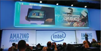  ??  ?? Intel chief executive Brian Krzanich shows off Cannon Lake hardware at its CES 2017 presentati­on