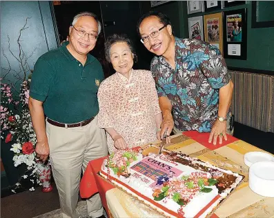  ?? File photo by Ernest A. Brown ?? John Chan, owner of Chan’s Fine Oriental Dining on Main St. in Woonsocket, right, celebrates 106 years in business with his brother Bill Chan, of Lincoln, left, and his mother Ethel Chan, of Woonsocket during the anniversar­y party at Chan’s in 2011....