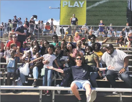  ?? Contribute­d photo ?? Notre DameWest Haven grad Jeremy Longobardi, with members of the Governor’s Participat­ion Partnershi­p, at a UConn football game last season.