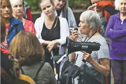  ?? STAFF PHOTOS BY DAN HENRY ?? Mary Headrick speaks Tuesday during a Truth to Power Rally hosted by Hamilton County Indivisibl­es at Miller Park.