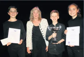  ??  ?? Former mayor Cherry Beath with the junior winner and runners up