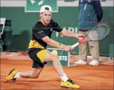  ?? Clive Brunskill / Getty Images ?? Diego Schwartzma­n, seeded 12th, rallied from being down 2-1 in sets to upset No. 3 seed Dominic Thiem on Tuesday.