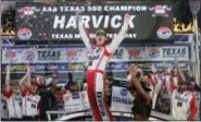  ?? LM OTERO — THE ASSOCIATED PRESS ?? Kevin Harvick celebrates in Victory Lane after winning the NASCAR Cup Series auto race at Texas Motor Speedway in Fort Worth, Texas, Sunday.