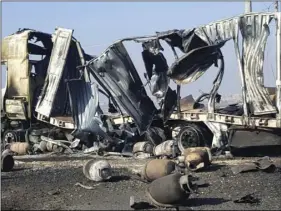  ??  ?? This photo released on Friday by the Syrian official news agency SANA, shows a damaged truck. According to Syrian state TV on Thursday night, a convoy carrying aid and heading toward Afrin, Syria was targeted by Turkish artillery, in al-Ziara village....