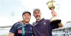  ??  ?? Happy days: Gillespie, right, won the county title in 2014