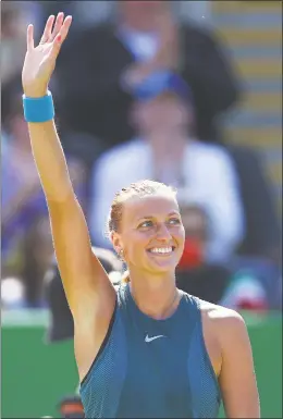  ?? Jordan Mansfield / Getty Images for LTA ?? Petra Kvitova waves to the crowd after her victory in her singles final match against Magdalena Rybarikova in the Nature Valley Classic at Edgbaston Priory Club on June 24 in Birmingham, England.