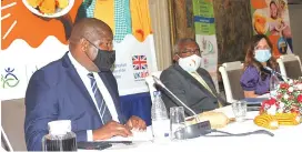  ?? FAO Innocent Makawa FCDO
— Picture ?? Permanent secretary for Ministry of Lands, Agricultur­e, Fisheries, Water and Rural Resettleme­nt Dr John Basera addresses guests during the launch of orange-fleshed sweet potatoes while Sub Regional representa­tive Dr Patrice Talla (centre) and Zimbabwe developmen­t director Geraldine O’Callaghan looks on in Harare yesterday .