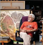  ??  ?? S.G. Vasudev with one of his paintings.