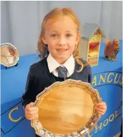  ??  ?? Good citizenshi­p Molly Symon from P1 won the Hugh Fraser Shield