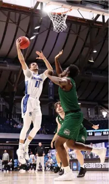  ?? Getty IMaGes ?? HANG TIME: Creighton guard and Hamilton native Marcus Zegarowski goes up for a shot during the Bluejays’ second round victory over Ohio.