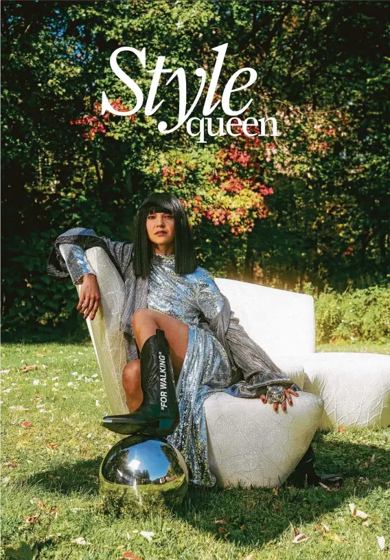  ?? Ben Sklar / Contributo­r ?? Laura Lee wears a Florence Bridge silver robe (a custom look for Khruangbin’s Paris show in December 2019), boots by OffWhite and a tiger ring that was a gift from a fan.