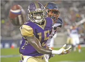  ?? PHELAN M. EBENHACK ASSOCIATED PRESS ?? Atlanta Legends receiver Seantavius Jones misses a catch in front of Orlando Apollos defensive back Marquez White on Saturday in an Alliance of American Football game in Orlando, Fla.