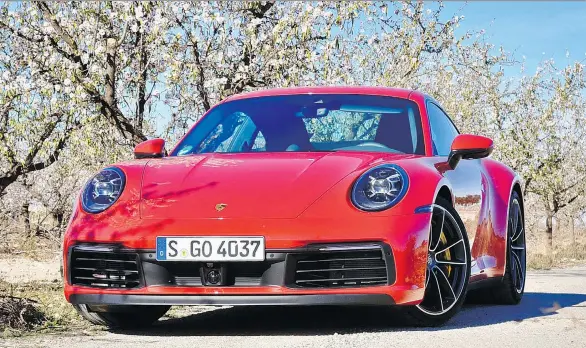  ?? PHOTOS: DEREK MCNAUGHTON/DRIVING ?? Driving.ca’s Derek McNaughton says “gorgeous” is the word that best describes the bigger, heavier and often criticized 2020 Porsche 911.