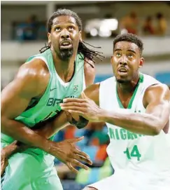  ??  ?? Aminu contests with Brazilian player at the Rio Games