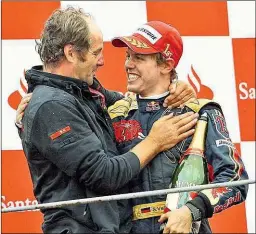  ??  ?? Am 14. September 2008 führte Gerhard Berger als Teamchef Sebastian Vettel zum Triumph in Monza.