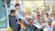  ?? PTI PHOTO ?? Congress president Rahul Gandhi meets supporters during his visit to Kanakagiri, Karnataka, on Sunday.