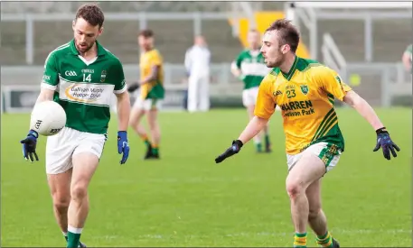  ??  ?? Damian Clifford, Listry in action against Mossie Hogan, Castlegreg­ory during the Castleisla­nd Co Op Mart County Junior Football Championsh­ip Final at Austin Stack Park on Sunday