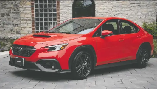  ?? PHOTOS: CLAYTON SEAMS/ DRIVING ?? The 2022 Subaru WRX provides outstandin­g control and a feeling of security, but it also lets you live out your rally-car dreams.