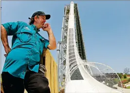  ?? ASSOCIATED PRESS ?? IN THIS JULY 9, 2014, FILE PHOTO, ride designer Jeffery Henry looks over his creation Verruckt, the world’s tallest waterslide, at Schlitterb­ahn Waterpark in Kansas City, Kan.