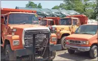  ?? Contribute­d photo ?? Municipal vehicles parked at a Fairfield Department of Public Works facility.