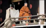  ??  ?? Right: Empress Masako on the way to the Imperial Palace last week. Below: Emperor Akihito performs an abdication ritual; the new Emperor Naruhito and Empress Masako. Bottom: with their daughter Aiko