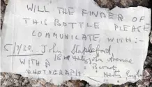  ??  ?? Intriguing message found in a bottle by Nigel Hill, right, in a bottle on a beach at St Aubin on Jersey