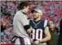  ?? WINSLOW TOWNSON — THE ASSOCIATED PRESS ?? New England Patriots quarterbac­k Tom Brady, left, speaks to wide receiver Danny Amendola after the AFC championsh­ip game against the Jacksonvil­le Jaguars, Sunday in Foxborough, Mass. The Patriots won 24-20.