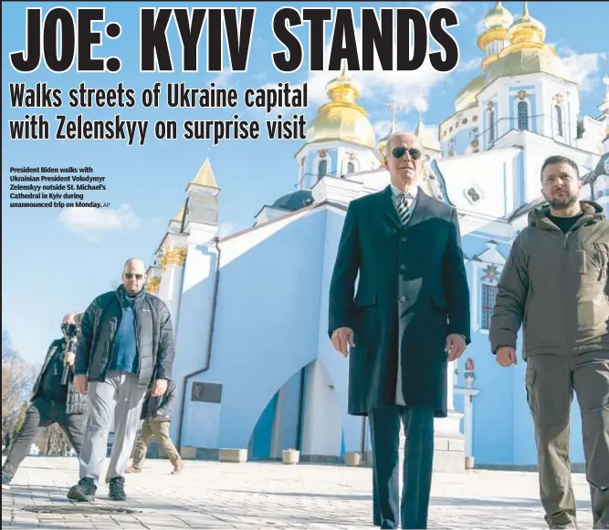  ?? AP ?? President Biden walks with Ukrainian President Volodymyr Zelenskyy outside St. Michael’s Cathedral in Kyiv during unannounce­d trip on Monday.