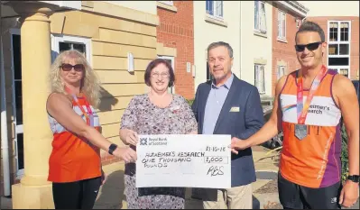  ??  ?? Hinckley couple Scott and Glenda Bailye have raised just under £10,000 for Alzheimer’s Research by taking part in a marathon and other fundraisin­g activities From left: Glenda Bailye, Susan Shaw, Dave Lock, Scott Bailye