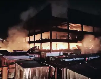  ?? | SUPPLIED; SIMPHIWE MBOKAZI African News Agency (ANA) ?? A DEADLY fire engulfed the Kaserne building at the Kwa Mai-Mai market in Joburg early yesterday. Above left and left, the devastatio­n can be seen after the blaze.