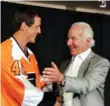  ?? LEN REDKOLES/NHLI VIA GETTY IMAGES ?? Ed Snider, right, in 2013 with Philadelph­ia’s newly acquired centre, Vincent Lecavalier.